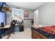 Bedroom with desk and a flat screen tv at 8234 S Vandriver Way, Aurora, CO 80016