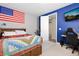 Bedroom with desk and a flat screen tv at 8234 S Vandriver Way, Aurora, CO 80016