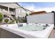 A luxurious hot tub on a patio, perfect for relaxation and entertaining in a backyard setting at 8234 S Vandriver Way, Aurora, CO 80016
