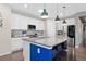 Stylish kitchen with granite countertops, stainless steel appliances, and a mosaic backsplash at 8234 S Vandriver Way, Aurora, CO 80016