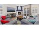Living room featuring a fireplace, comfortable seating, and a sliding door to outdoor space at 8234 S Vandriver Way, Aurora, CO 80016
