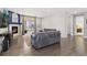 Cozy living room featuring a fireplace, comfortable seating, and a sliding door to outdoor space at 8234 S Vandriver Way, Aurora, CO 80016