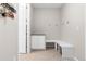 Functional mudroom with built-in bench seating and storage cabinets, perfect for entryway organization at 8234 S Vandriver Way, Aurora, CO 80016