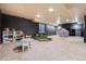Large finished basement featuring neutral carpet, recessed lighting and a play area at 10028 Chelmsford Ter, Parker, CO 80134