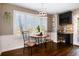 Breakfast nook with table and chairs next to large window with views of the outdoors at 10028 Chelmsford Ter, Parker, CO 80134