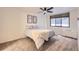 Cozy bedroom with neutral carpet, ceiling fan, and good natural light at 830 N Sherman St # 208, Denver, CO 80203