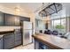 Modern kitchen with countertops, stainless steel appliances, and a central island at 830 N Sherman St # 208, Denver, CO 80203