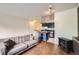 Cozy living room with a sofa and a view into the adjacent kitchen area at 830 N Sherman St # 208, Denver, CO 80203