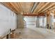 Unfinished basement with exposed ceiling and concrete flooring at 16643 E 101St Ave, Commerce City, CO 80022