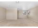 Spacious bedroom features neutral walls, carpeted floors, and a window allowing natural light to fill the room at 16643 E 101St Ave, Commerce City, CO 80022