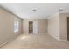 Carpeted bedroom features neutral walls, a window, and a door leading to another space at 16643 E 101St Ave, Commerce City, CO 80022