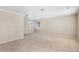 Bright, carpeted bedroom with neutral walls, two windows, and overhead lighting at 16643 E 101St Ave, Commerce City, CO 80022