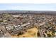 Expansive aerial view of the city showcasing Denver skyline with a neighborhood in the foreground at 30 Garfield St # B, Denver, CO 80206