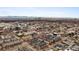 Wide aerial shot of a community with cityscape and mountain views at 30 Garfield St # B, Denver, CO 80206