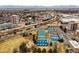 Extensive aerial view featuring colorful tennis courts and lush green spaces at 30 Garfield St # B, Denver, CO 80206