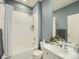 Stylish bathroom with a white tub, modern fixtures, and a neatly decorated vanity area at 30 Garfield St # B, Denver, CO 80206