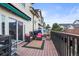 Relaxing outdoor deck with comfortable seating area and outdoor grill, perfect for entertaining at 30 Garfield St # B, Denver, CO 80206