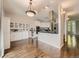 Bright kitchen space with stainless appliances, granite counters, and seamless transition to dining area at 30 Garfield St # B, Denver, CO 80206
