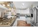 Modern kitchen features granite countertops, stainless steel appliances, and ample cabinet space at 30 Garfield St # B, Denver, CO 80206