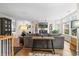 Bright living room features a fireplace, built-in shelving, and ample natural light from the large windows at 30 Garfield St # B, Denver, CO 80206