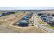 Aerial view shows a home within a well-planned community with green spaces and walking paths at 117 Nova Ct, Erie, CO 80516
