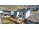 Aerial view of the neighborhood and surrounding area, showcasing backyard and landscape at 117 Nova Ct, Erie, CO 80516