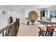 Upstairs office with neutral carpet, large woven wall decor and ample natural light at 117 Nova Ct, Erie, CO 80516