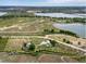 Aerial view of property with home and outbuildings outlined in yellow at 14831 Riverdale Rd, Brighton, CO 80602