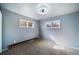 Bedroom with carpeted floors, neutral walls and plenty of natural light at 14831 Riverdale Rd, Brighton, CO 80602