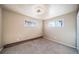 Neutral bedroom with natural light and carpet flooring at 14831 Riverdale Rd, Brighton, CO 80602