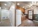 Cozy kitchen featuring wood cabinets and modern appliances at 14831 Riverdale Rd, Brighton, CO 80602