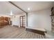 Spacious living room featuring an attached kitchen and beautiful flooring at 14831 Riverdale Rd, Brighton, CO 80602