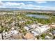 Aerial image showcasing a neighborhood near a lake and park at 4490 W 45Th Ave, Denver, CO 80212