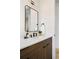 Modern bathroom vanity with wood cabinets and quartz countertop at 4490 W 45Th Ave, Denver, CO 80212