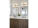 Modern bathroom with double sinks and sleek fixtures at 4490 W 45Th Ave, Denver, CO 80212