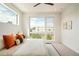 Bright bedroom with large windows and comfortable bedding at 4490 W 45Th Ave, Denver, CO 80212