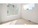 Well-lit bedroom with neutral walls and carpeted floors at 4490 W 45Th Ave, Denver, CO 80212