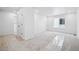 Bright and spacious bedroom with plush carpeting, a walk-in closet, and a large window at 16671 W 93Rd Ave, Arvada, CO 80007