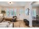 Bright living room with modern finishes, hardwood floors and lots of natural light at 1818 S Humboldt St, Denver, CO 80210