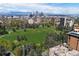 Expansive aerial view of city skyline and park, showcasing the property's close proximity to downtown amenities at 1100 Gaylord St, Denver, CO 80206