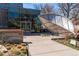 Modern building featuring glass windows, artistic leaf decor, and accessible pathways at 1100 Gaylord St, Denver, CO 80206