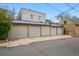 Multiple car garage featuring multiple bays offering secure parking and storage for vehicles and equipment at 1100 Gaylord St, Denver, CO 80206