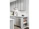 Modern kitchen features stainless steel appliances, sleek countertops, and ample storage space for efficient cooking at 1100 Gaylord St, Denver, CO 80206