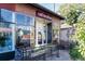 Inviting storefront with large windows, flower boxes, and a charming 