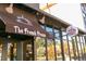 Modern storefront featuring 'The French Press' signage and ample natural light through large windows at 1100 Gaylord St, Denver, CO 80206