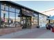 Inviting storefront with multiple windows, black awning and street-facing pedestrian access at 1100 Gaylord St, Denver, CO 80206