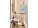 Classic bathroom includes sink, toilet and shower with curtain at 3265 S Ogden St, Englewood, CO 80113