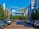 Street view of the Cherry Creek North neighborhood with decorative awning at 150 S Harrison St # 9, Denver, CO 80209