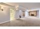 Finished basement offers flexible space with a fireplace and extra storage at 10712 Larson Dr, Northglenn, CO 80233