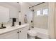 Updated bathroom featuring modern fixtures, shower-tub combo, and sleek design at 10712 Larson Dr, Northglenn, CO 80233